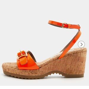 Stella MacCartney neon orange cork sandals.
